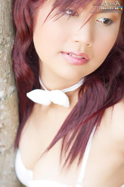 15P Asian redhead in a bunny costume