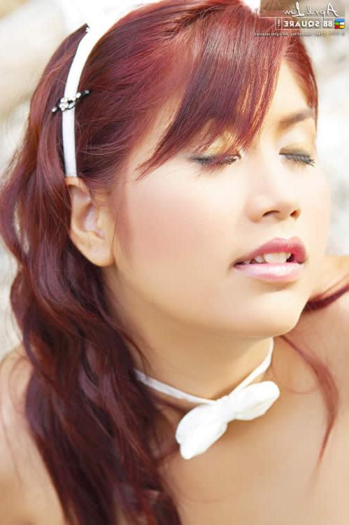 15P Asian redhead in a bunny costume