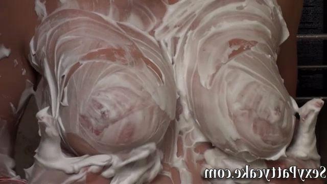 20P Messy blonde teen Pattycake rubs white frosting on her tits and ass in the showe