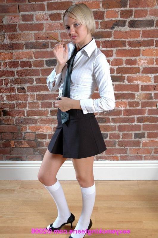 16P Bad girl teen in school uniform exposes her cute tits while smok
