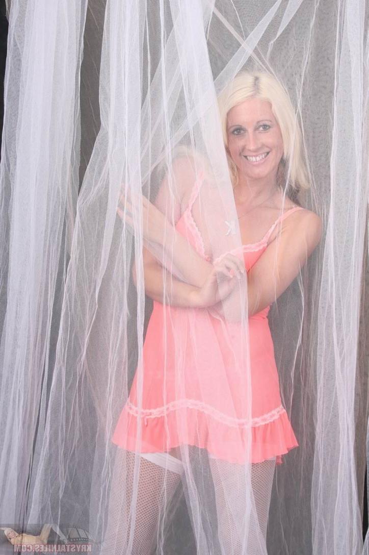 15P Leggy Krystal Niles in sexy lingerie and white fishnet stockings