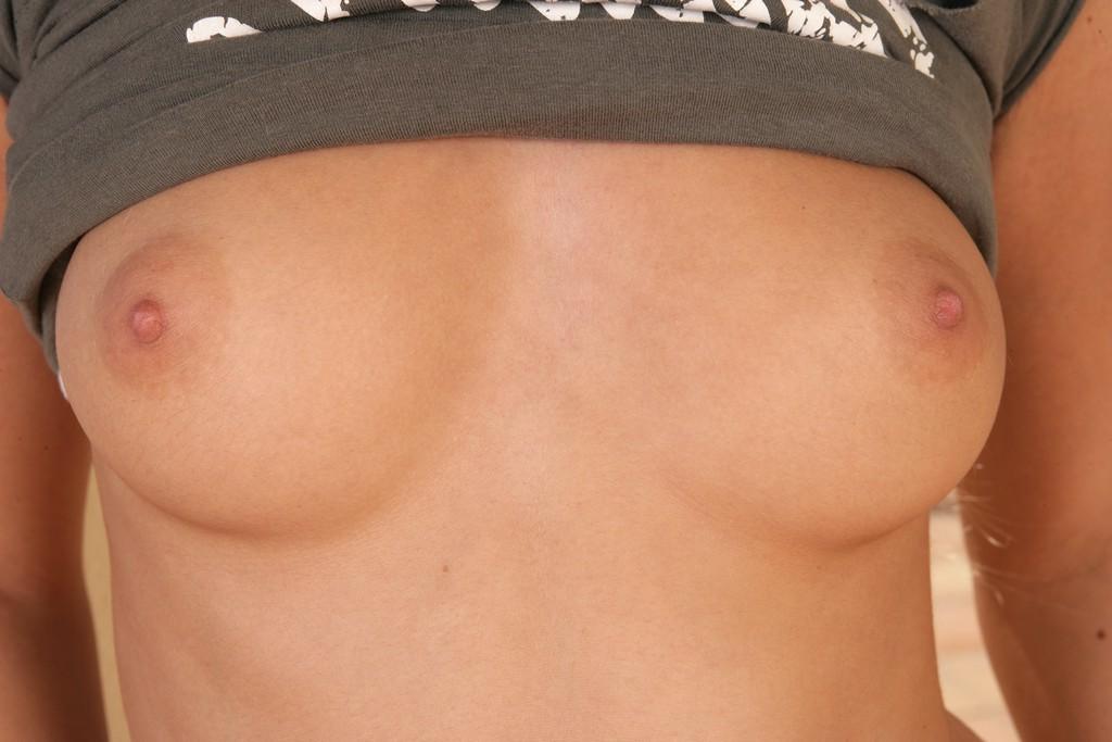 18P Petite teen babe drops her panties to spread and finger pussy