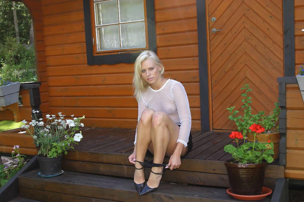 17P Blonde teen shows her shaved pussy on the porch