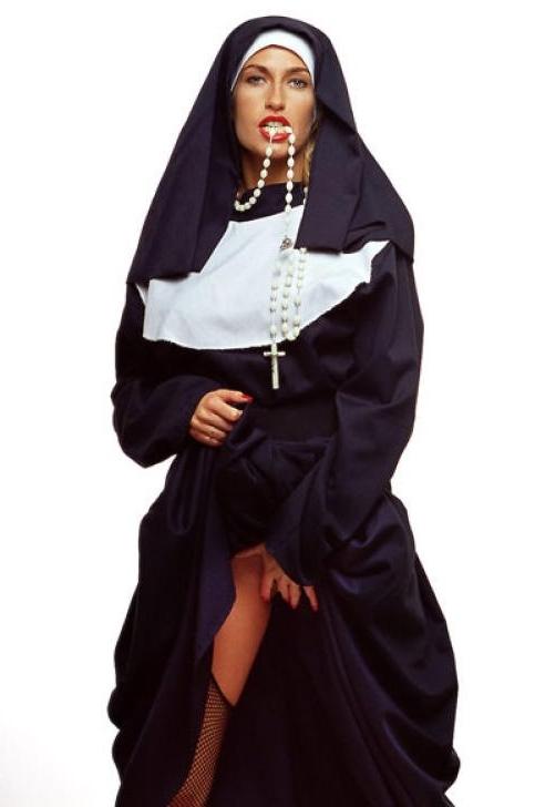 12P sinful nun in black stockings posing sexy