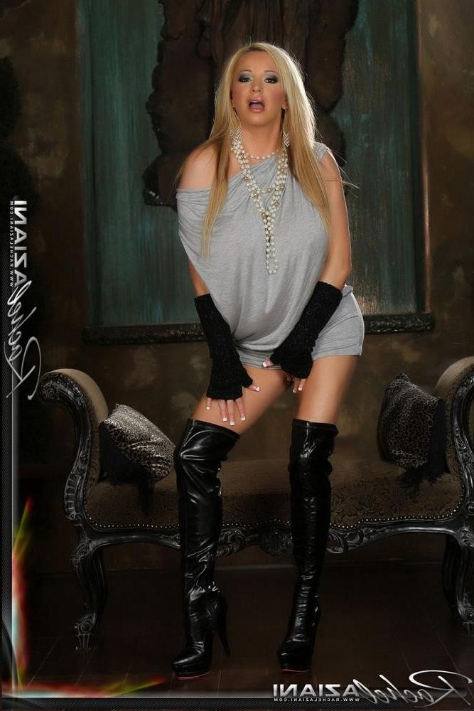 15P Rachel Aziani in thigh high fuck me boots lifts up her dress to show a hairy bus