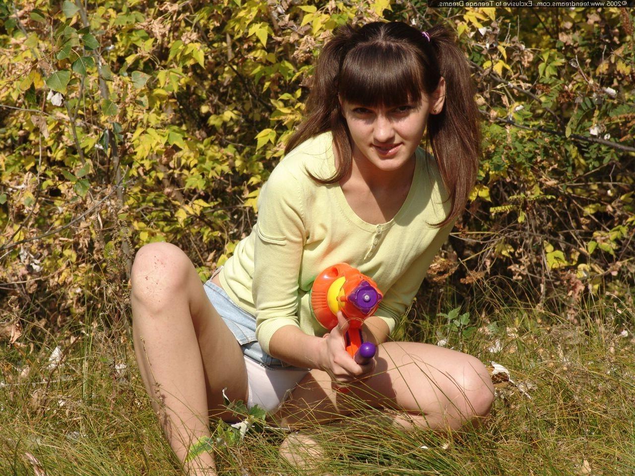 18P Russian teen Juliya strips in a field