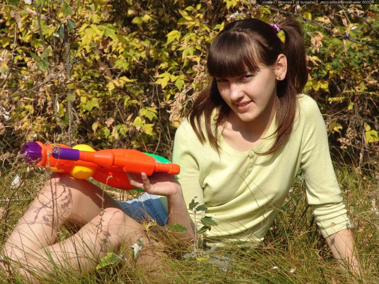 18P Russian teen Juliya strips in a field