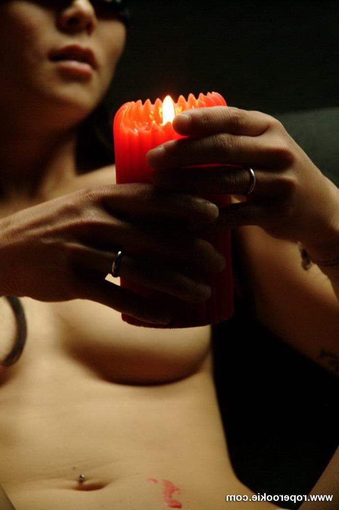 15P Asian model pours candle wax all over her body while blindfolded.
