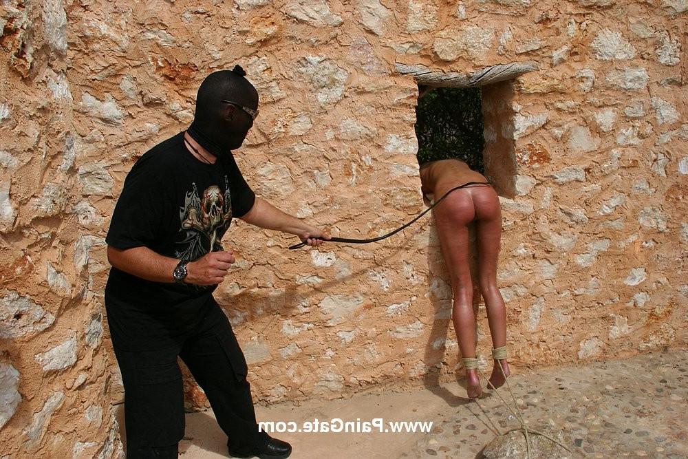 18P Skinny woman getting whipped outdoors