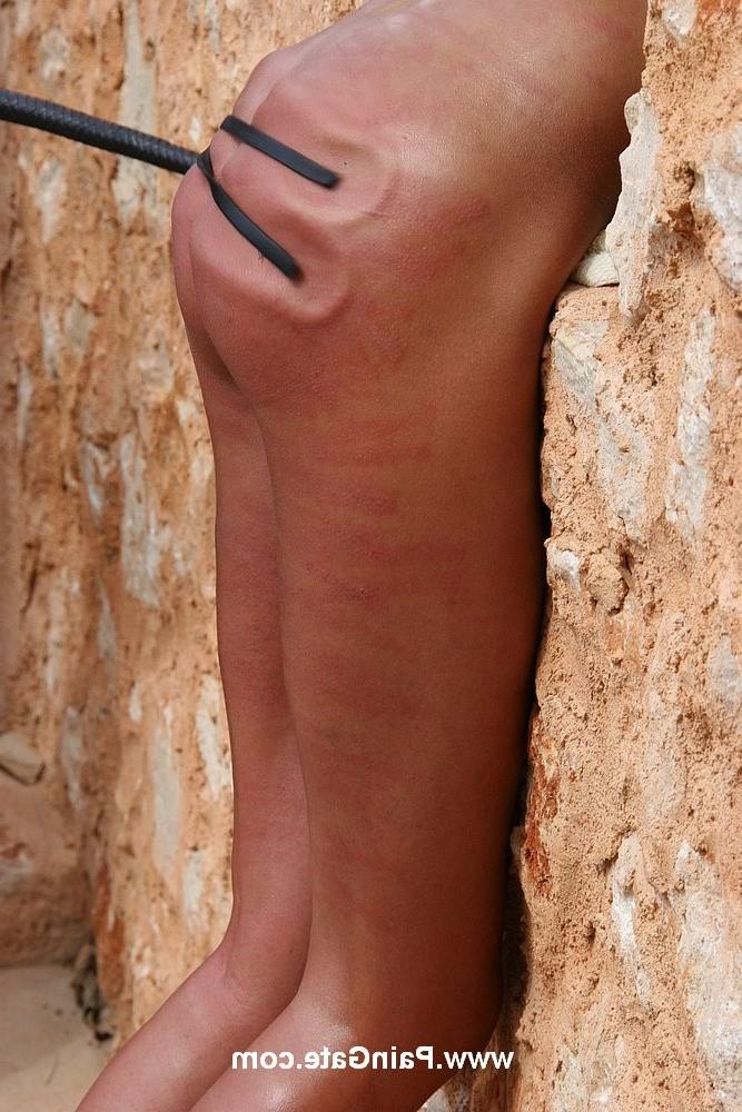 18P Skinny woman getting whipped outdoors