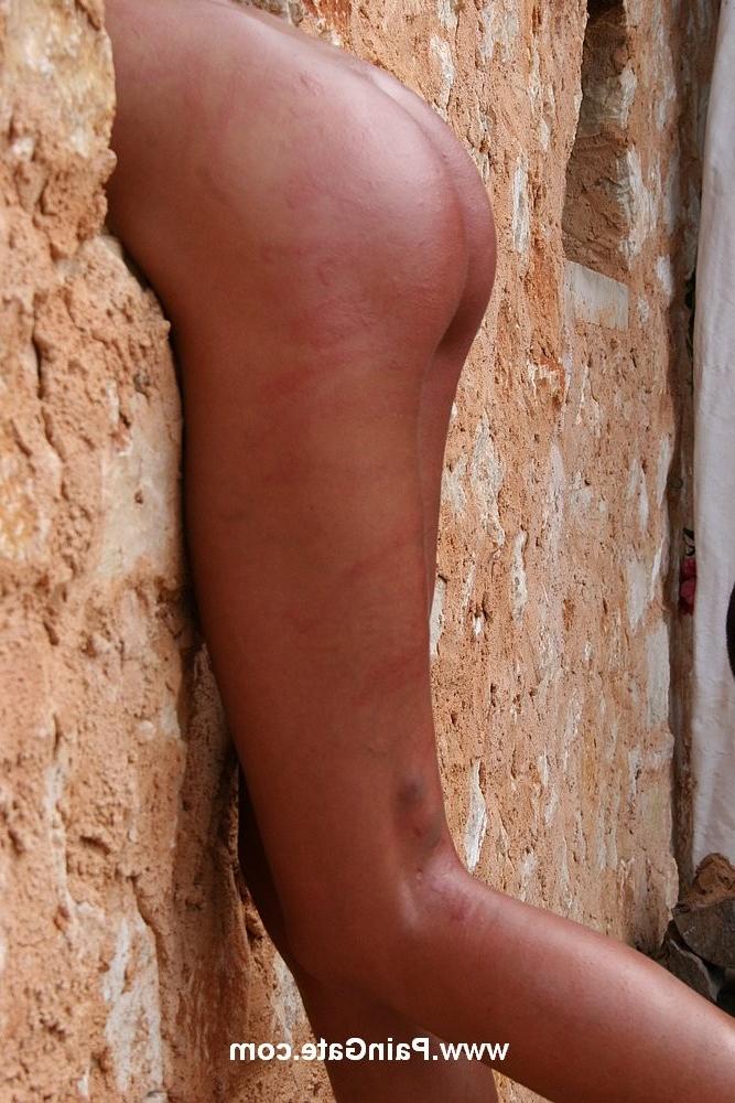18P Skinny woman getting whipped outdoors
