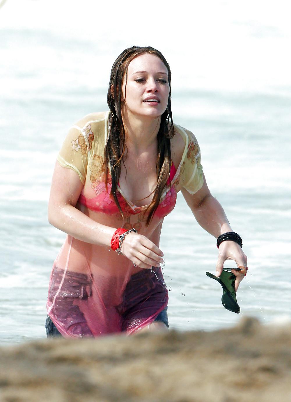 24P Hilary Duff at the Beach playing around in a wet shirt