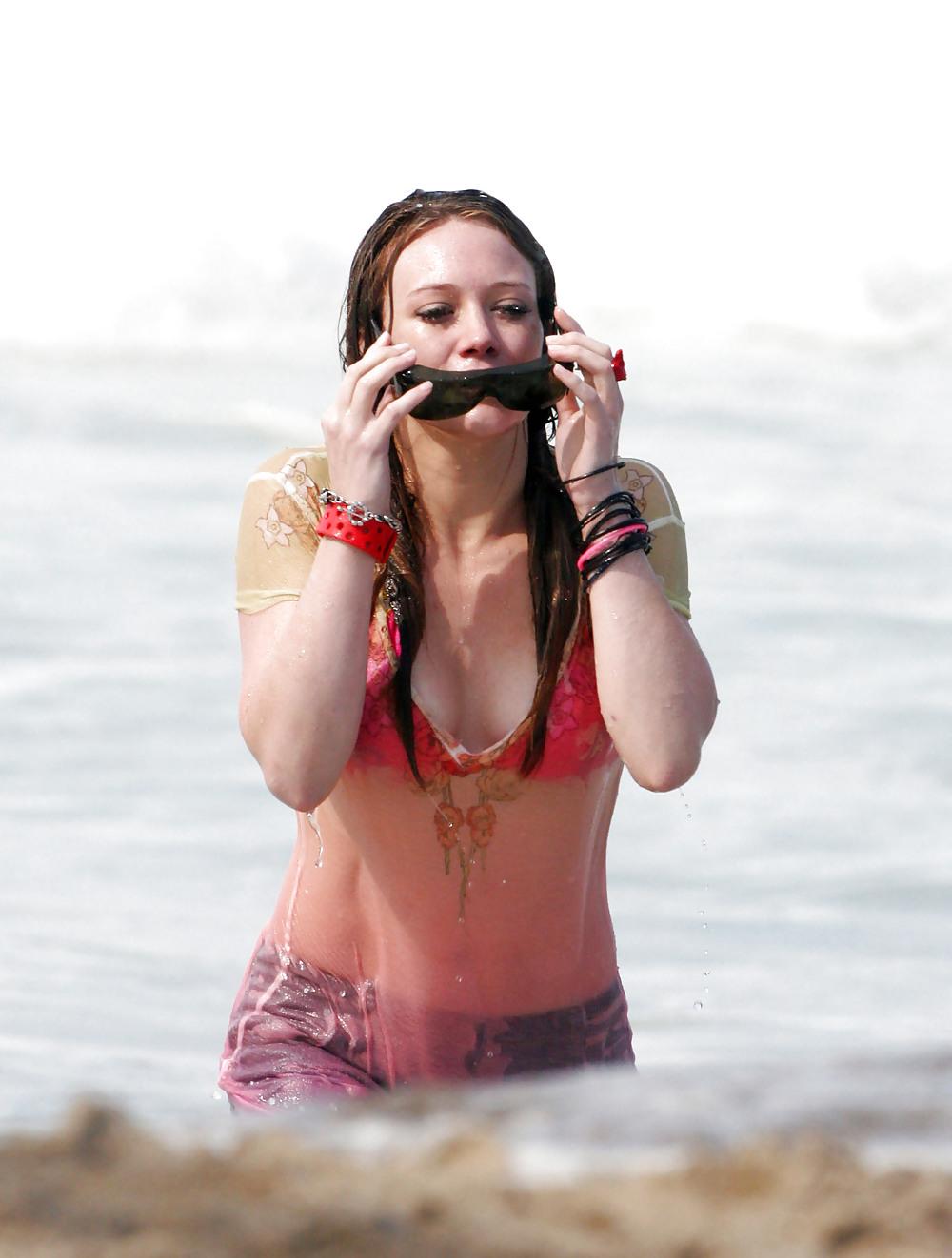 24P Hilary Duff at the Beach playing around in a wet shirt