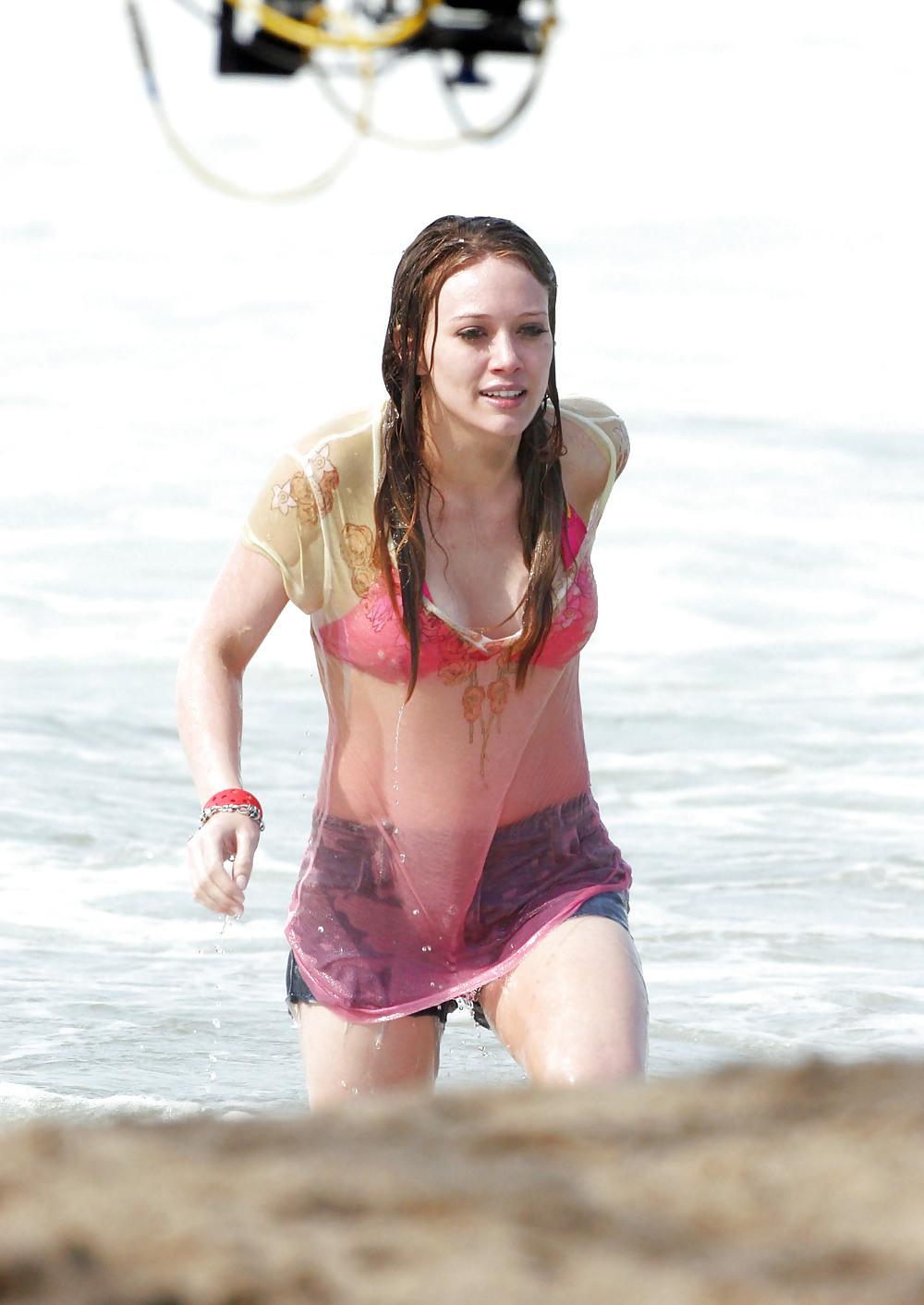 24P Hilary Duff at the Beach playing around in a wet shirt