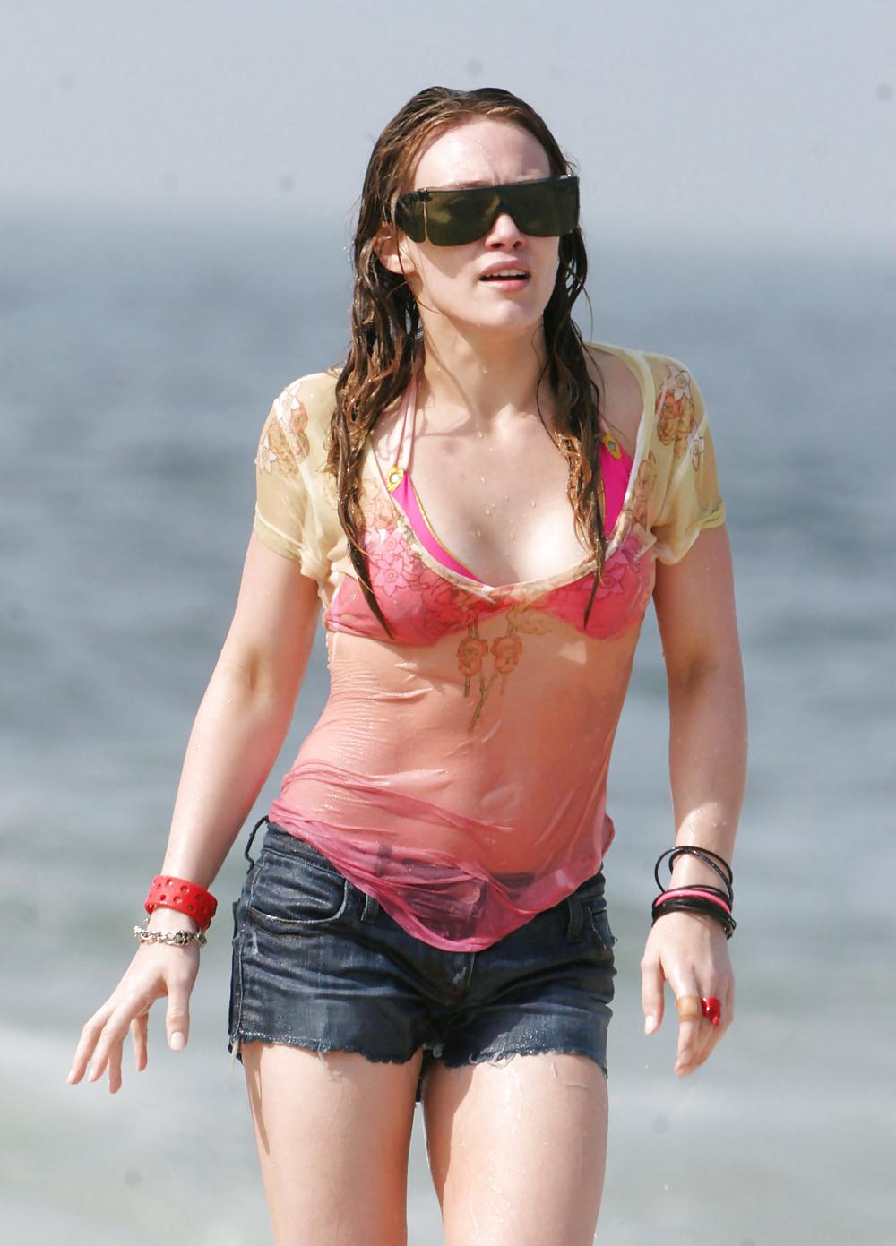 24P Hilary Duff at the Beach playing around in a wet shirt