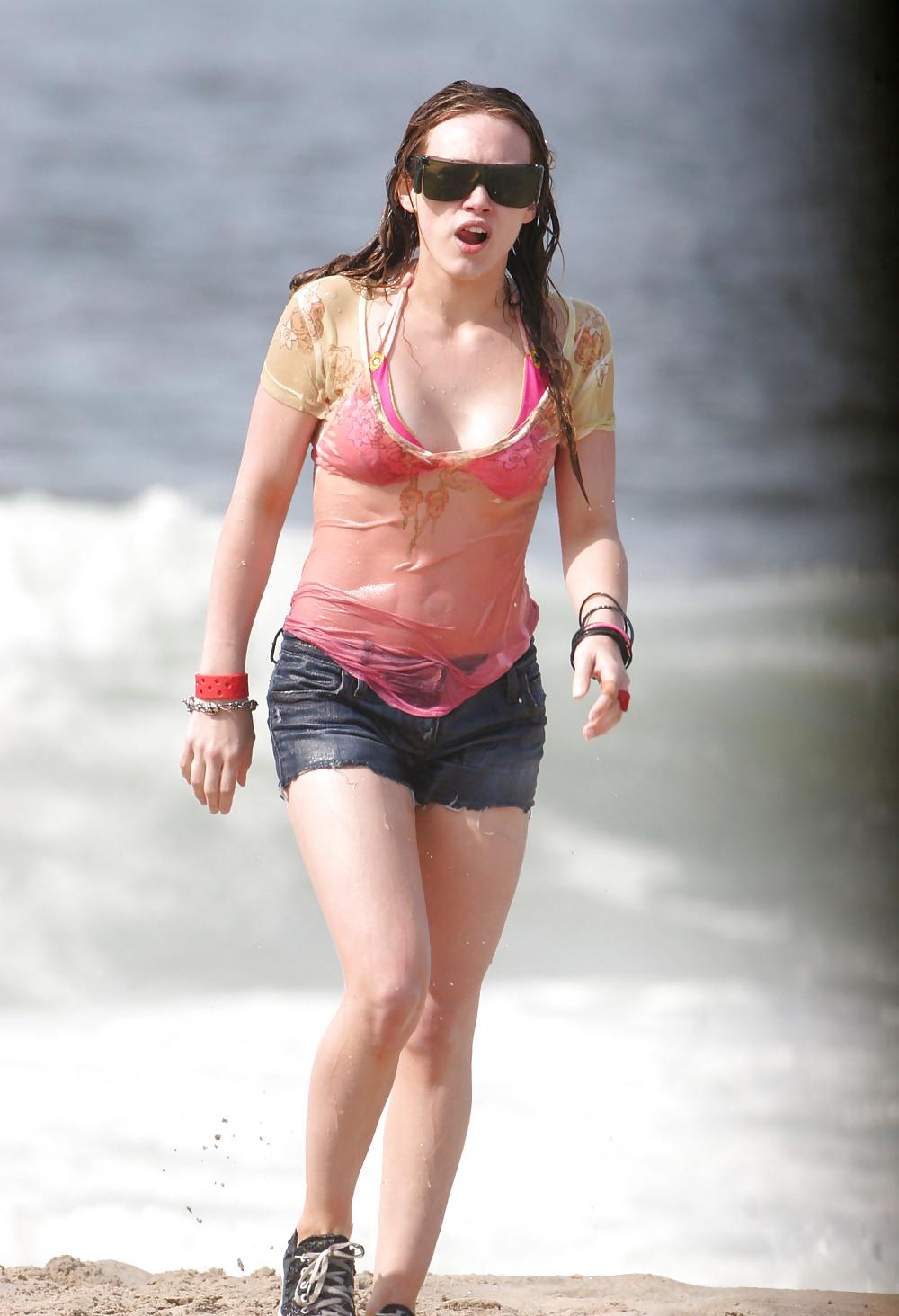 24P Hilary Duff at the Beach playing around in a wet shirt
