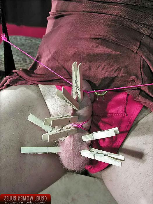10P Latex queen trains her man pinching his nuts and cock with pins