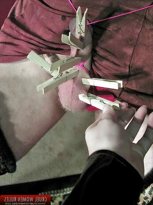 10P Latex queen trains her man pinching his nuts and cock with pins