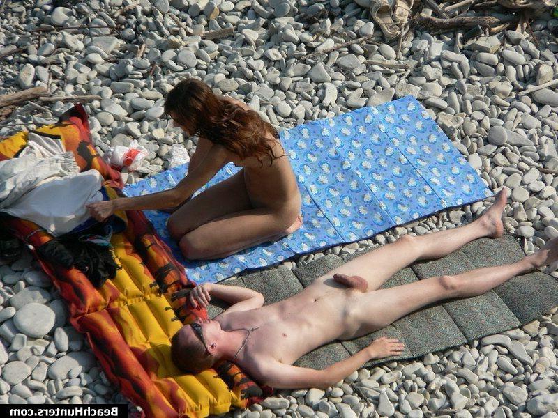 15P Nudist babes on a public beach