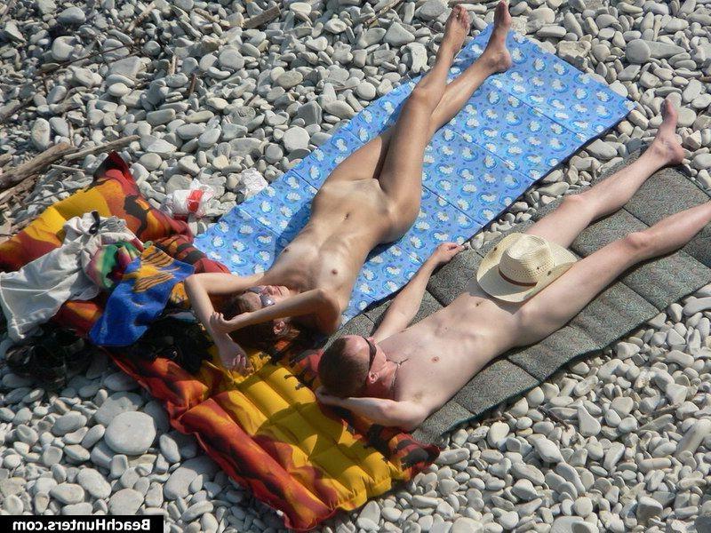 15P Nudist babes on a public beach
