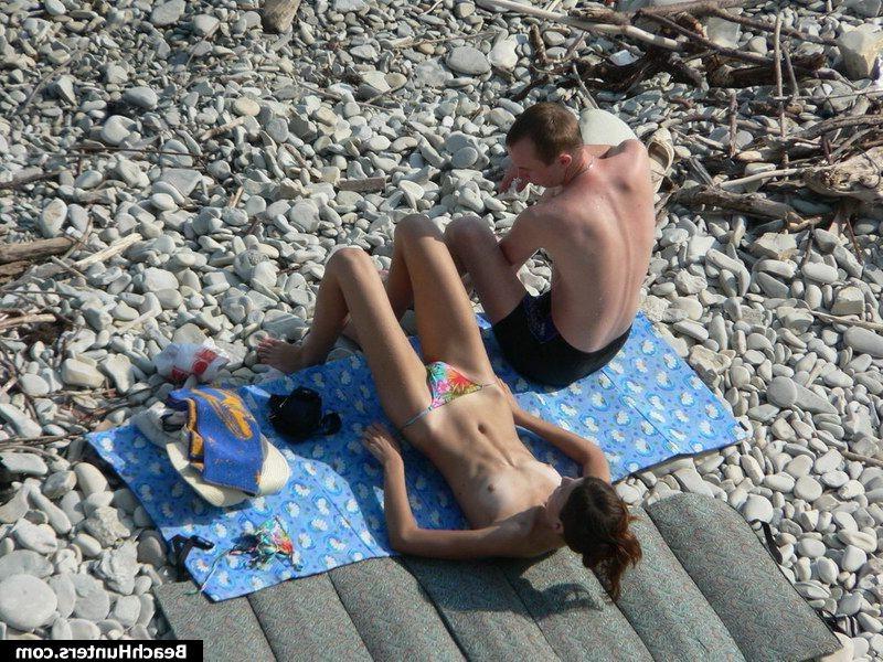 15P Nudist babes on a public beach