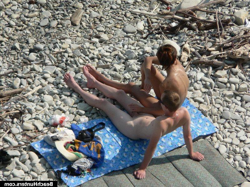 15P Nudist babes on a public beach