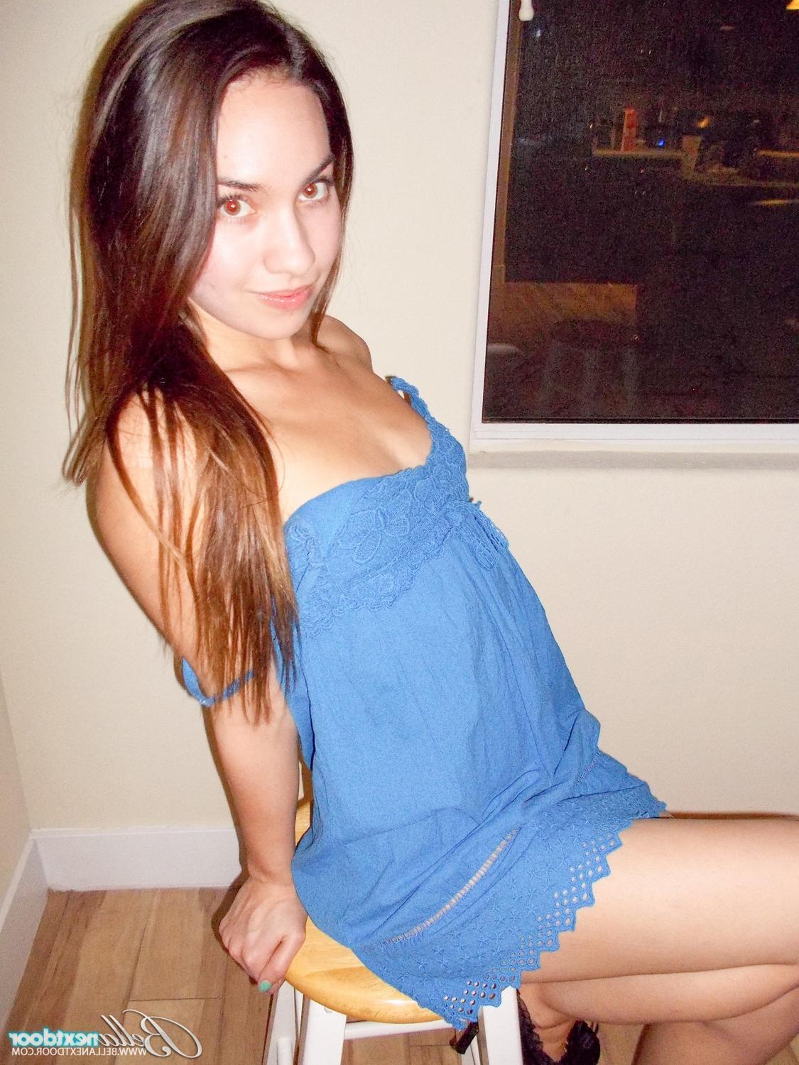 15P Delectable teen Anna Rio stripping off her blue dress