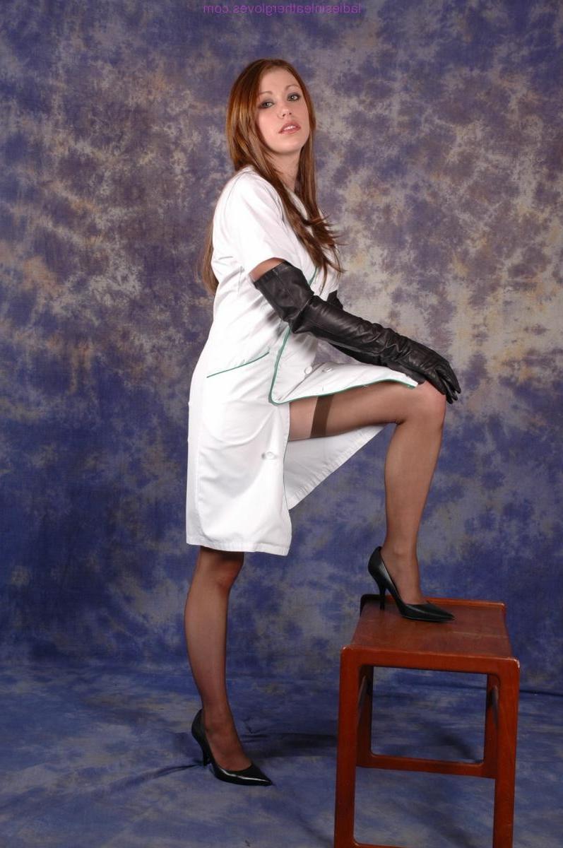 15P Gorgeous Nurse Sophie shows off her long sexy stockinged legs an