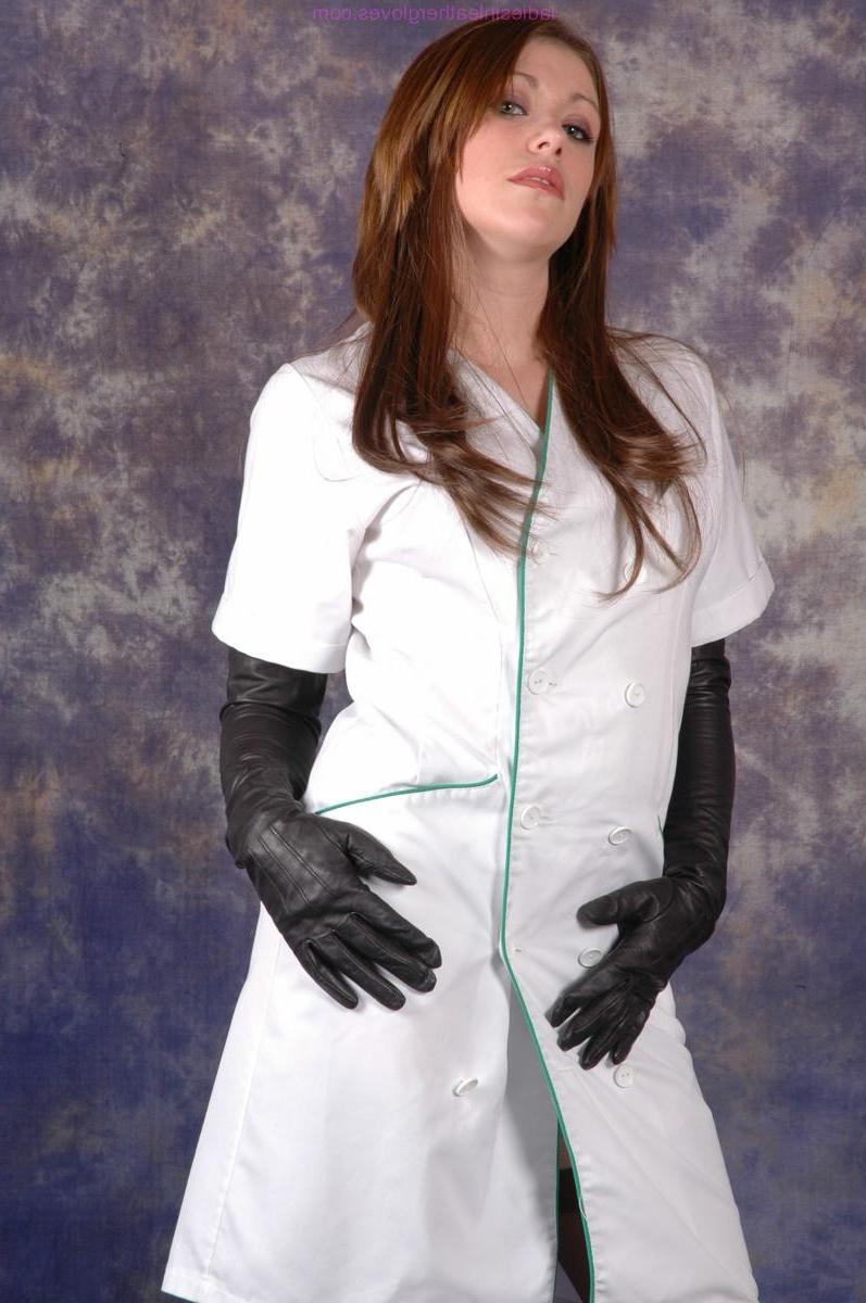 15P Gorgeous Nurse Sophie shows off her long sexy stockinged legs an