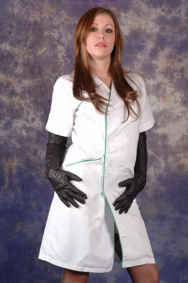 15P Gorgeous Nurse Sophie shows off her long sexy stockinged legs an