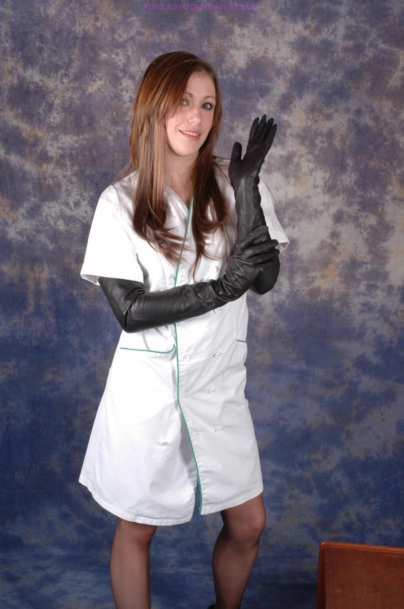 15P Gorgeous Nurse Sophie shows off her long sexy stockinged legs an