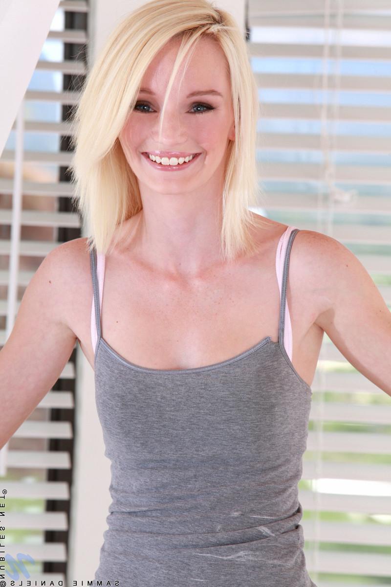 15P Petite teen cutie Sammie Daniels shows her pink pussy