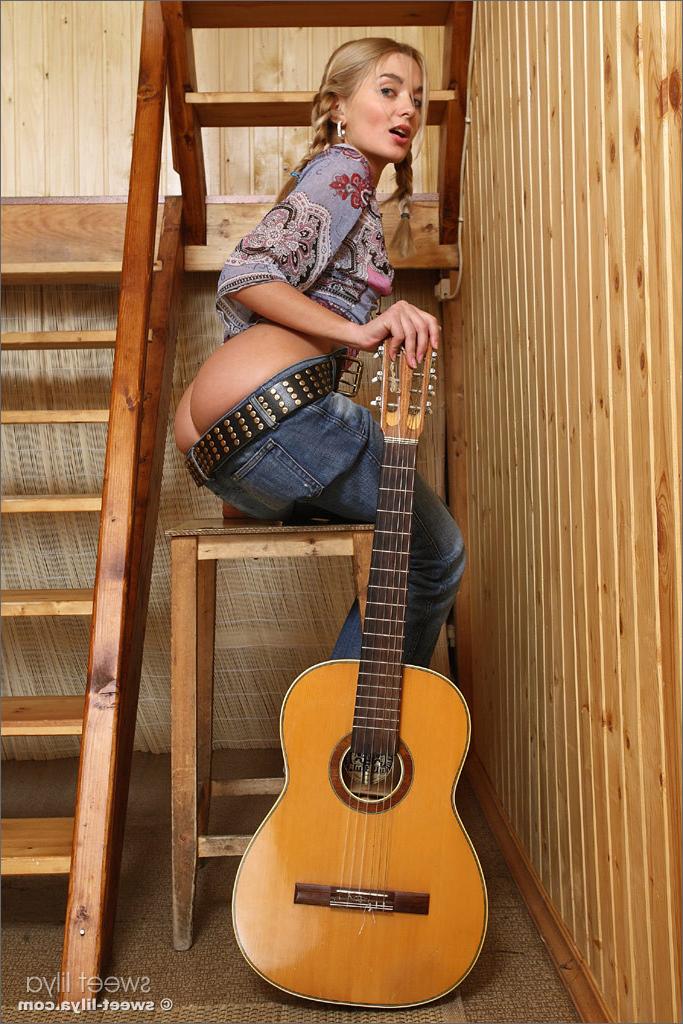 12P Gorgeous Russian teen Sweet Lilya strips and plays guitar naked