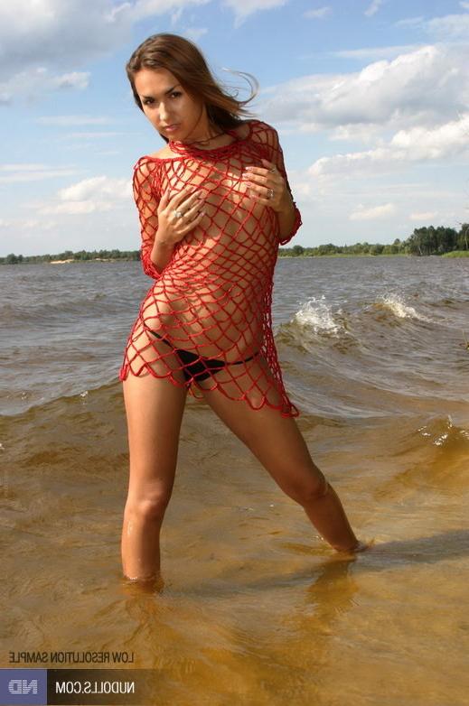15P Teen wears red fishnet outdoor...
