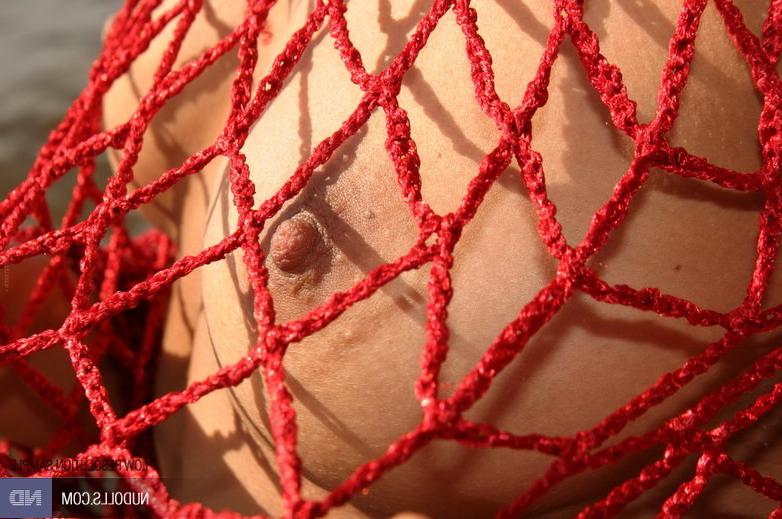 15P Teen wears red fishnet outdoor...