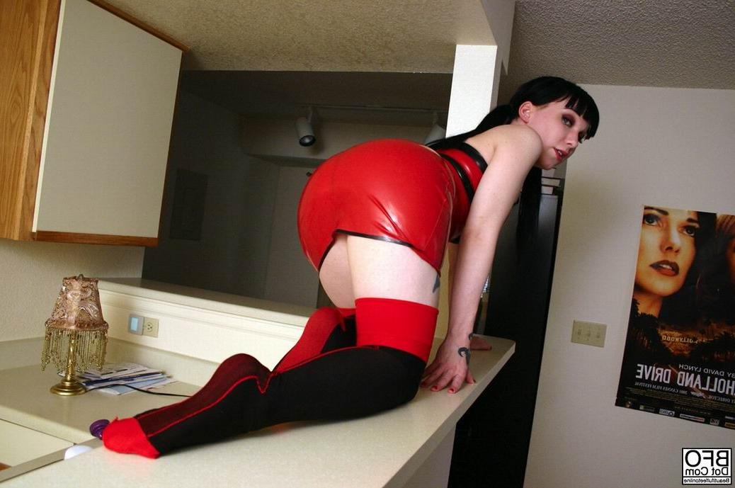 15P Slut in latex dress with beautiful feet in stockings