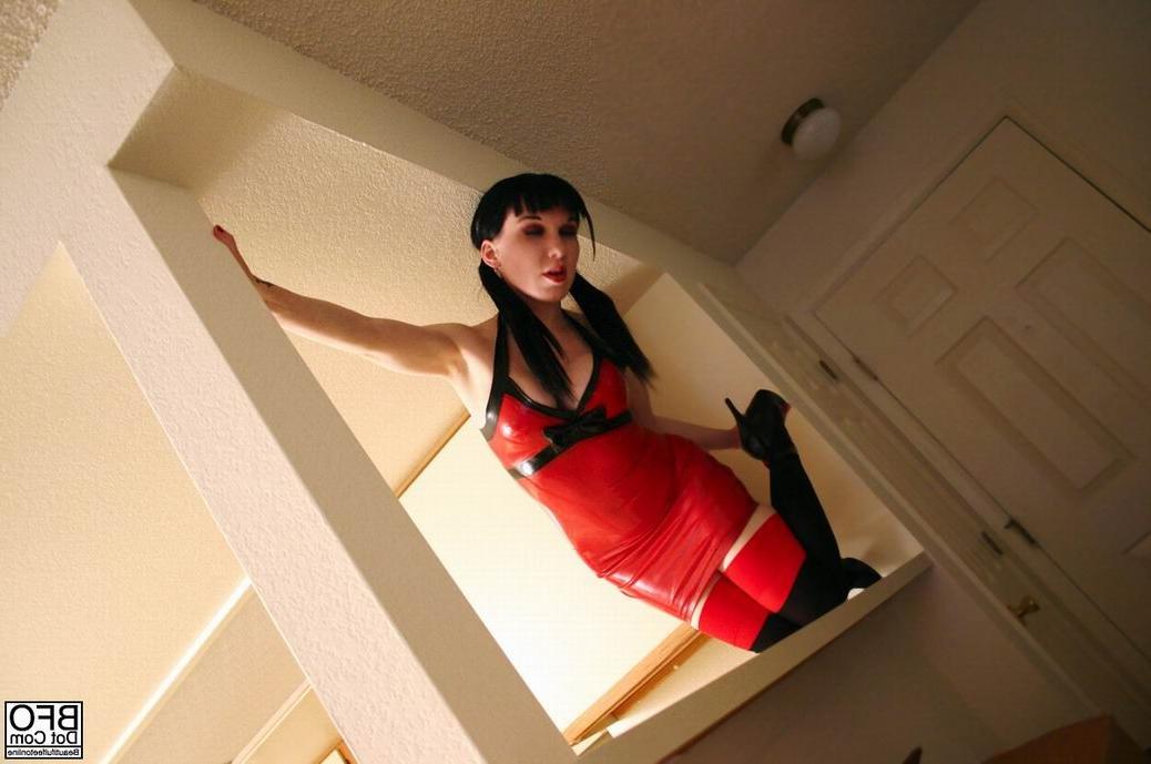 15P Slut in latex dress with beautiful feet in stockings