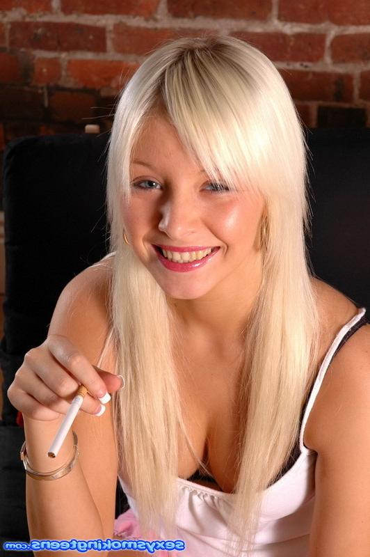15P Beautiful blonde teen smokes a long cigarette