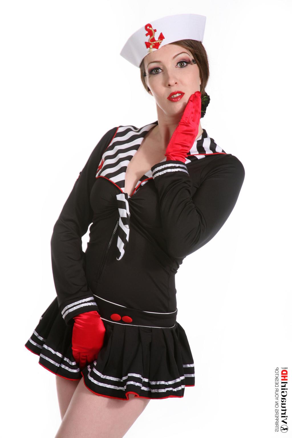 15P Babe stripping out her sexy sailor uniform and teasing topless