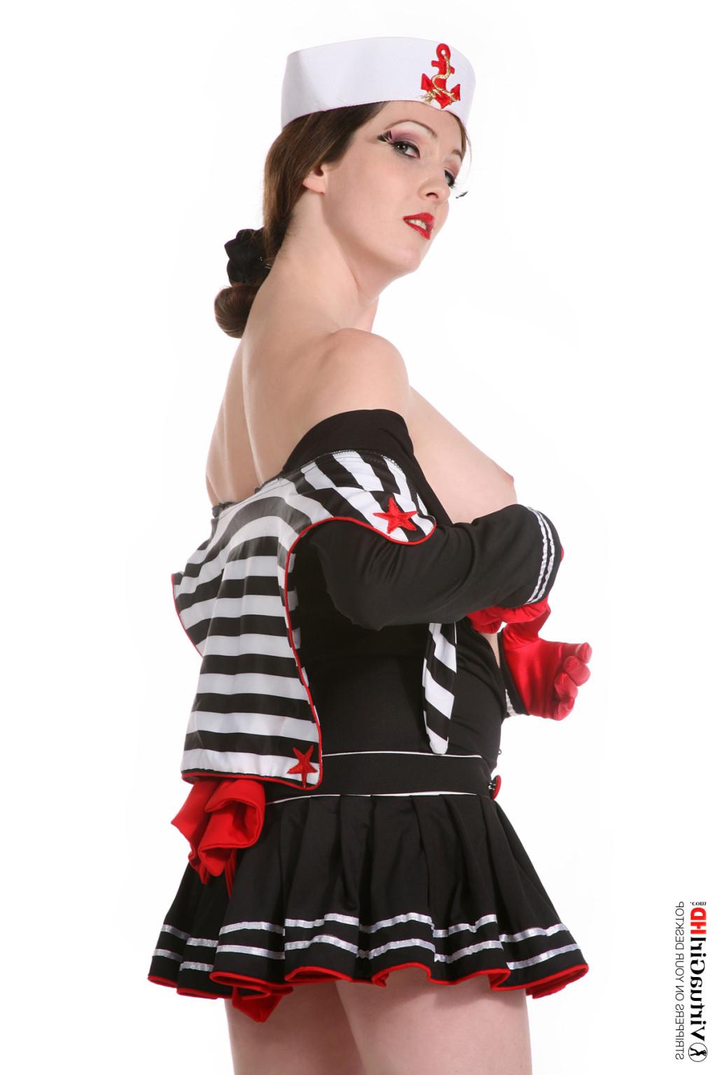 15P Babe stripping out her sexy sailor uniform and teasing topless