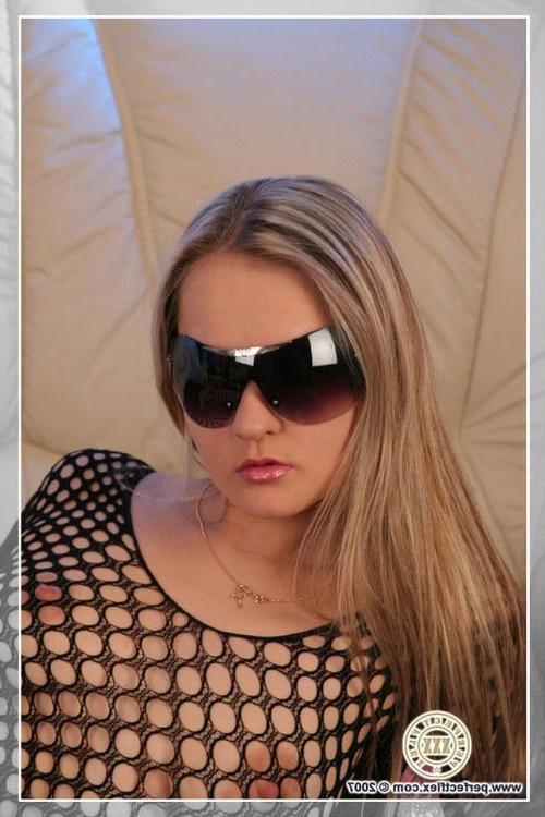 17P Flexible brunette chick in sexy fishnet outfit dildoing herself