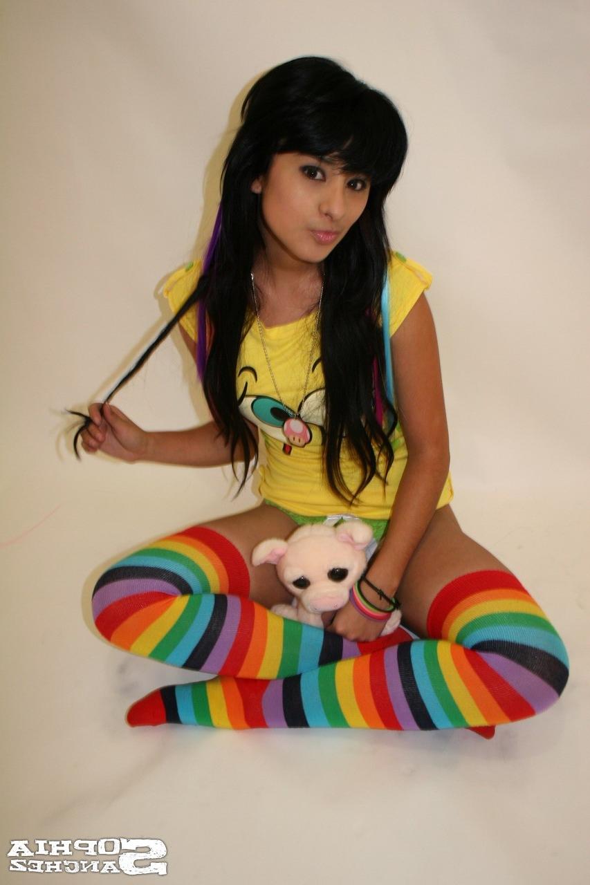 16P Busty latina in stripped socks