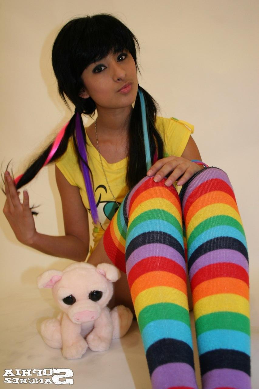 16P Busty latina in stripped socks