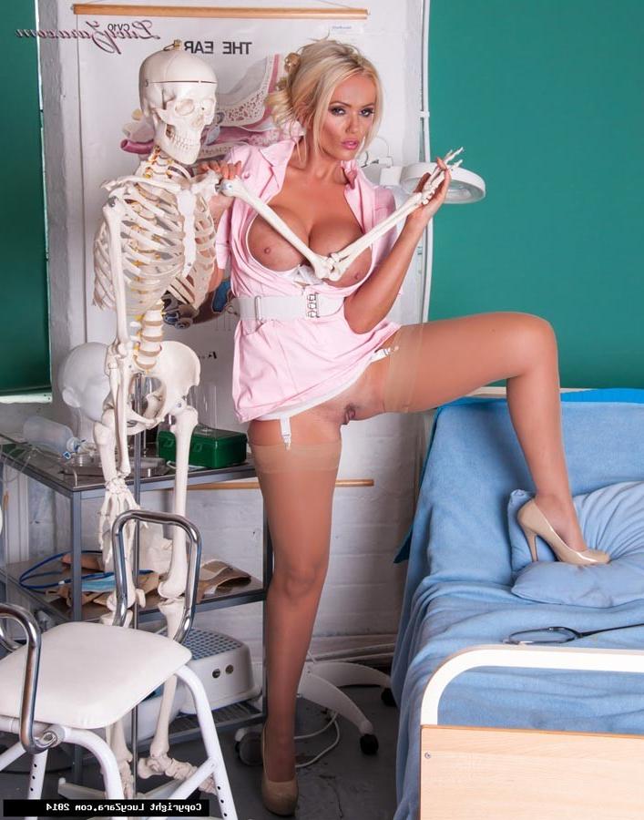 15P Horny nurse Lucy Zara spreading her wet gash