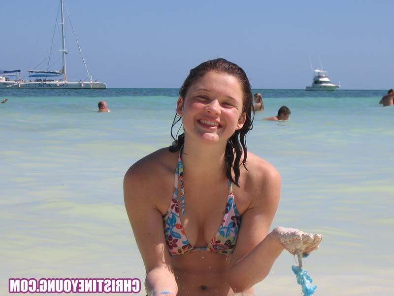 15P Teen cutie Christine Young posing outdoors in the tropics