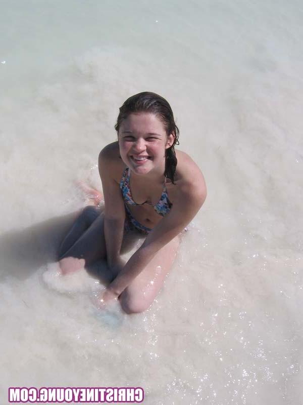 15P Teen cutie Christine Young posing outdoors in the tropics