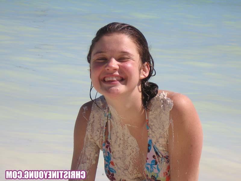 15P Teen cutie Christine Young posing outdoors in the tropics