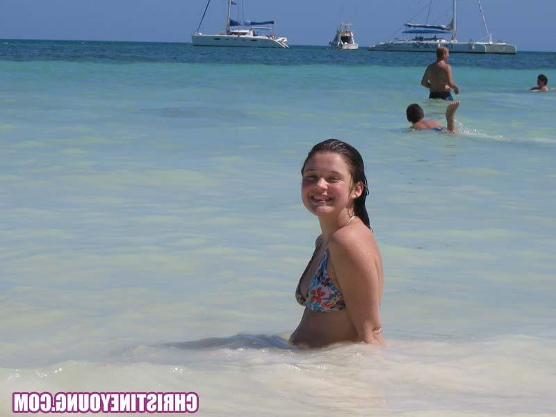 15P Teen cutie Christine Young posing outdoors in the tropics