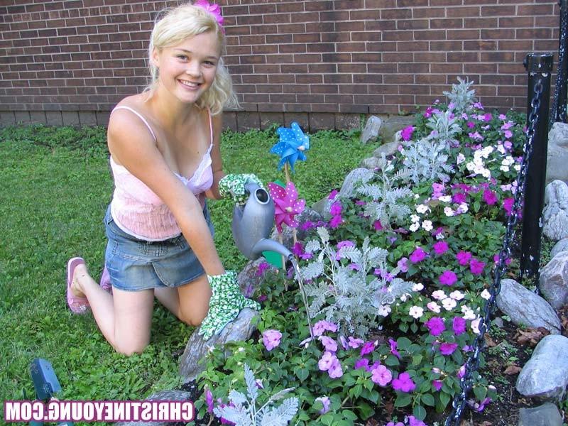 15P Blonde teen Christine Young gardening in backyard and posing