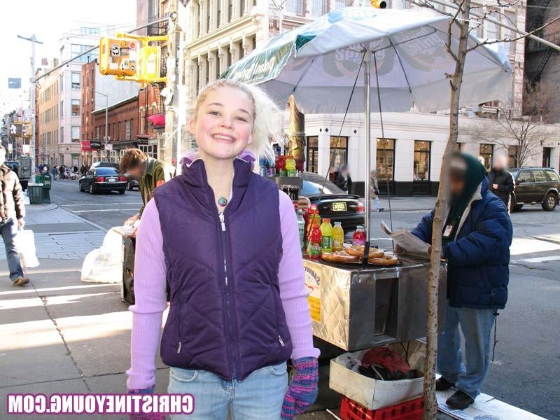 15P Fun-loving teen Christine Young posing and teasing outdoors
